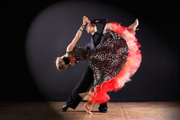dancers in ballroom isolated on black background