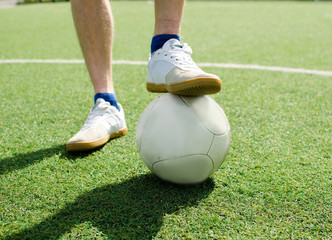 Young man making football freestyle