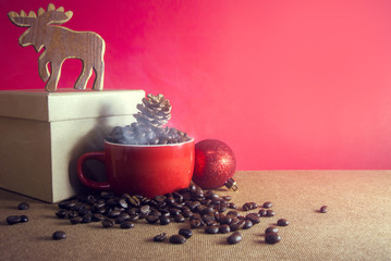 gift and coffee and wood deer on the table with decor ball