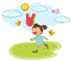 Little girl holding balloons in the park