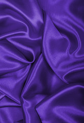 Smooth elegant lilac silk or satin texture as background