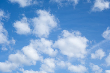 Naklejka na ściany i meble white clouds on a blue sky