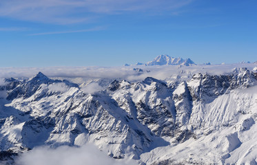 Winter panorama of the high Alps against the background of the m