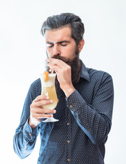 bearded man with nonalcoholic cocktail