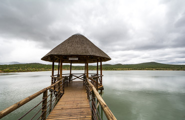 Wedding Chapel on a lake with a cloudy Background