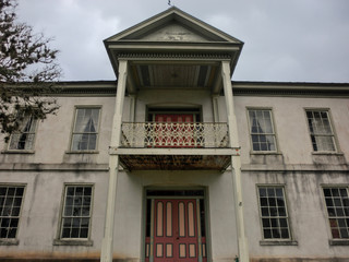 Grungy entrance of abandoned haunted house