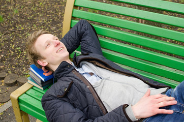 Young man relaxing in the park 