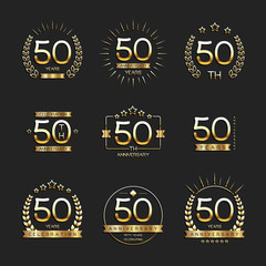 Naklejka premium Fifty years anniversary celebration logotype. 50th anniversary gold logo set.