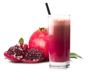ripe pomegranate juice fruit and its grains on white background