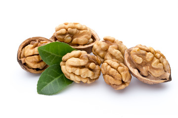 Walnut and walnut kernel isolated on the white background.