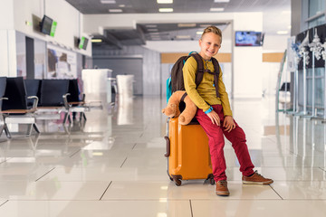 Adoralbe little boy at airport