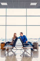 Young couple in waiting hall