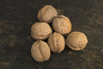 Walnuts, walnuts close-up, walnuts on a dark background, walnuts