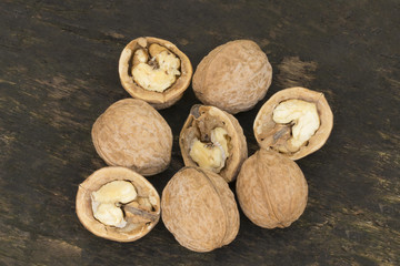 Walnuts, walnuts close-up, walnuts on a dark background, walnuts