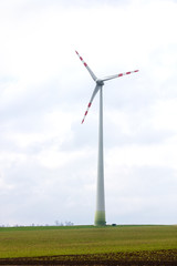 Windmill on field