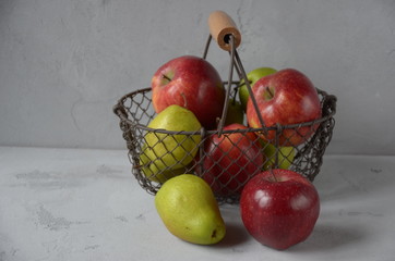 fresh apples and pears in the basket