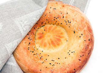 Traditional bread peoples of Central Asia - flat bread, baked in the tandoor oven
