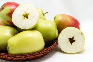 Autumn harvest - ripe apples on a white background
