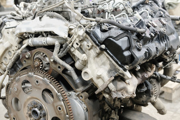 The image of a car engine with flywheel plate