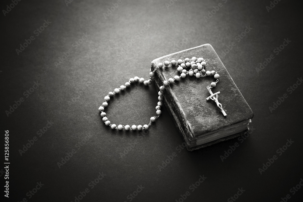 Wall mural rosary on the old bible