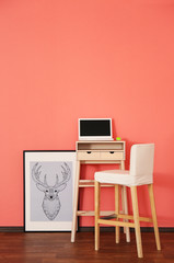 Modern workplace on wall background