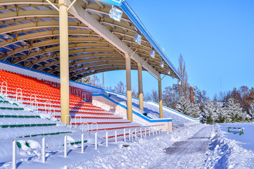 Naklejka premium Background chairs at stadium , winter