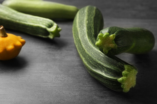 Fresh zucchini on color background