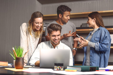 Students doing group project in campus library