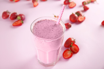 Berry milkshake on wooden table