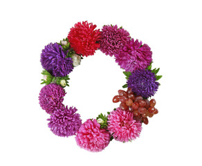 Red grape and floral arrangement on white background