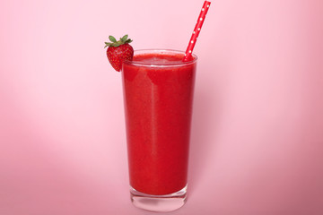 Strawberry smoothie on color background