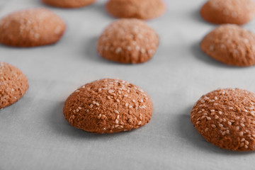 Freshly baked cookies on baking paper