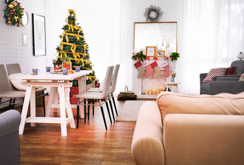 Fototapeta na wymiar Interior of living room decorated for Christmas