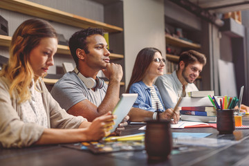 College students sitting together and studying