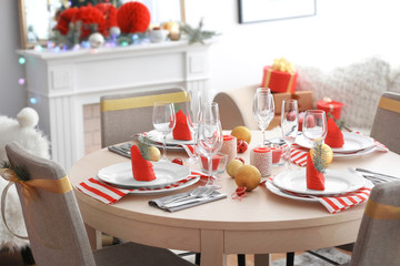 Table served for Christmas dinner in living room