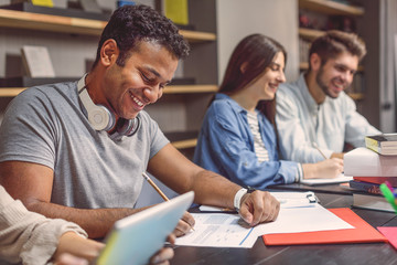 College students sitting together and studying