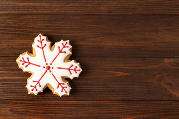 Tasty Christmas tasty cookie on wooden background