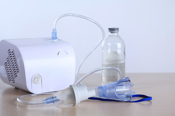 Inhalator mask vapor on a white background