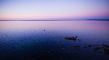 Fototapeta na wymiar Purple sunset over the ocean