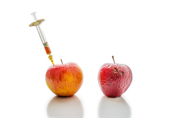 Fresh and old apple. As the concept of rejuvenation.