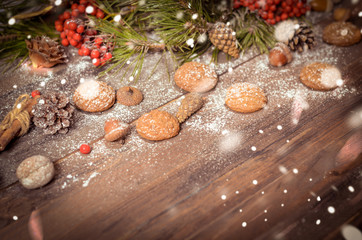 Obraz na płótnie Canvas New Year Decoration with Pine Branches, Oatmeal Cookies, Gingerb
