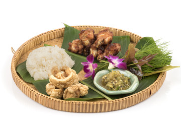 Fried chicken, rice, Green chili dip and Streaky pork with crispy crackling (a popular dish in northern Thailand).