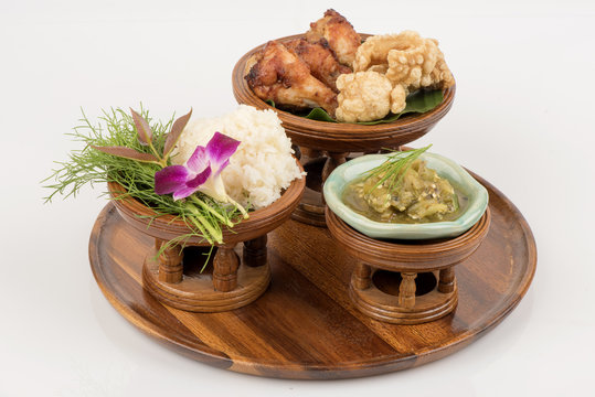 Fried chicken, rice, Green chili dip and Streaky pork with crispy crackling (a popular dish in northern Thailand).
