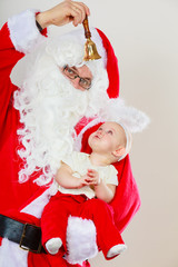 Santa claus with little baby.