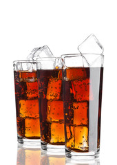 Glasses of cola soda drink cold with ice cubes
