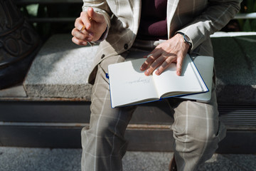 Man writing on his Notebook
