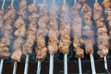 Skewers of meat on the coals.