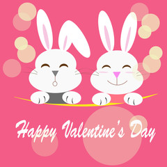 Fototapeta premium rabbit couple with the message of happy valentine's day