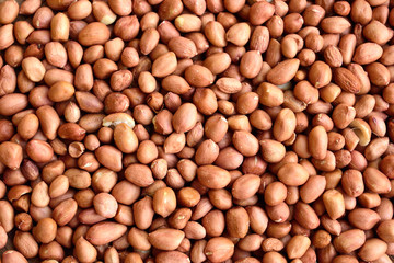 Roasted peanuts background in bamboo basket