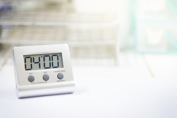 Timer count down laboratory equipment in over white tone.